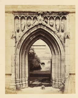 Portal of the ruins of Melrose Abbey, photograph, page, title: 'Richly molded Gothic portal',