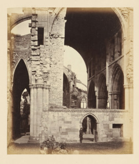 Interior of the ruins of Melrose Abbey with a man at a doorway, photograph, page, number: '(No. 8