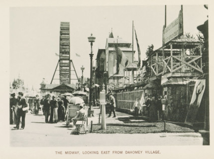 View of a street with national pavilions and a Ferris wheel at the World's Columbian Exposition in