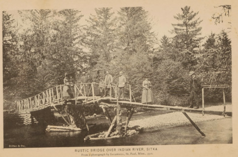 Group portrait of a group on a bridge in Sitka, Rustic bridge over Indian river, Sitka, page,