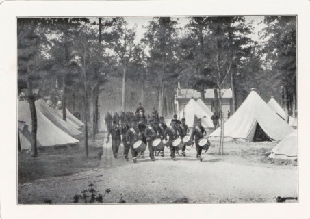 Soldiers marching into a tent camp, page, photomechanical print, photographer: Maurice Bucquet,