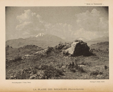 View of a landscape with a mountain range with snow-capped peaks in the background, page,