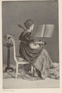 La Musique, Portrait of an unknown woman playing the guitar, page, photomechanical print,