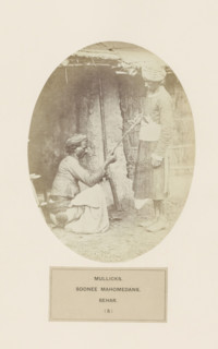 Two unknown men with a rifle from the Malik clan of Bihar in eastern India, photograph, page,