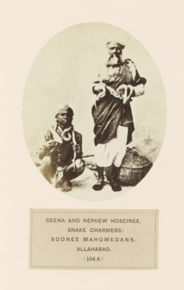Portrait of Deena and his cousin Hoseinee, two snake charmers from Prayagraj, Uttar Pradesh, India,