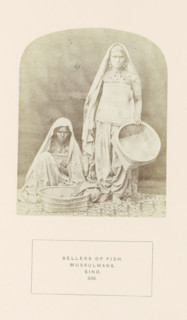 Portrait of two unknown fish sellers in Sindh, Pakistan, photograph, page, inscription: 'SELLERS OF