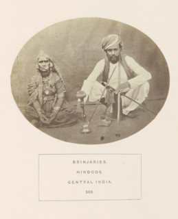 Portrait of two unknown people from the Banjara tribe with a hookah, Madhya Pradesh, India,