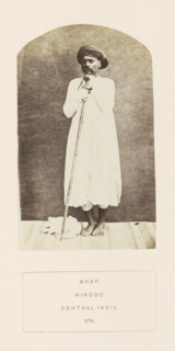 Portrait of an unknown man from the Bhat community with a rod, Madhya Pradesh, India, photograph,
