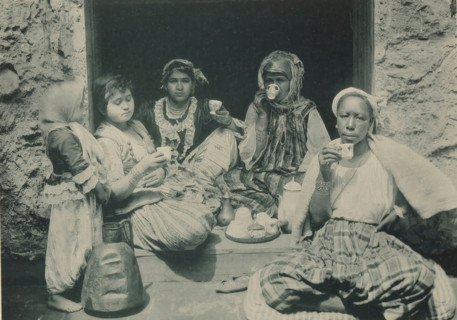 Four women drinking coffee in the Tunisian part of the Antwerp World Exhibition in 1894, Tunisia,