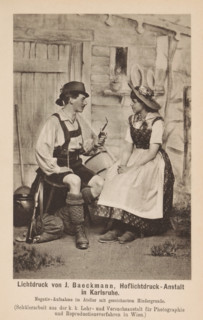 Man and woman in traditional clothing sitting in a photo studio, page, photomechanical print,
