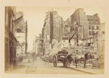 Rue du Bac & Rue de Lille, View of a horse cart in front of destroyed buildings the Rue du Bac and