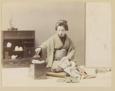 Woman making a doll, photograph, page, Japan, c. 1887 - in or before 1897, photographer, colorer