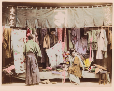 Display of merchandise in a second-hand clothing store, photograph, page, Japan, c. 1887 - in or