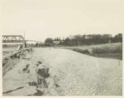 View of a collapsed railway bridge over the Nagara River in Japan after an earthquake, page,