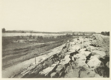 View of a collapsed railway bridge over the Nagara River in Japan after an earthquake, page,