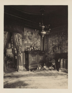 Room in the house of Antonin Terme with his collection of antiquities, wooden spinning wheel and a