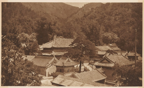 View of a landscape with mountains and roofs, page, photomechanical print, photographer: Donald