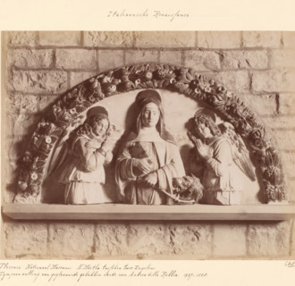 Tympanum addition depicting Martha between two angels by Andrea della Robbia, Florence. National