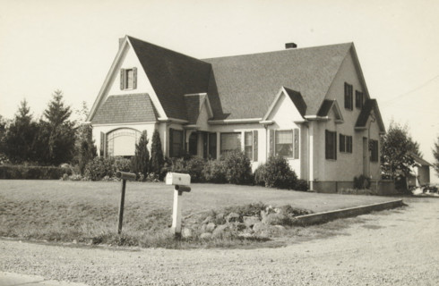 A country house in the west. Note the newspapers and mailboxes, Unknown location in the western