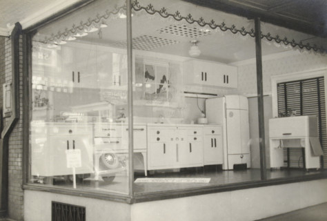 A Shop Window Displaying an Electric Kitchen, photograph, title: 'WINDOW WITH ELECTRIC KITCHEN