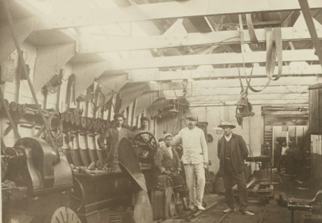 Machine shop, photograph, Interior of a machine shop. Photo pasted on cardboard, without texts.