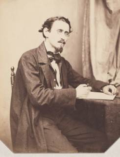 Portrait of possibly an architect, drawing with pencil in his hand, photograph, photographer: