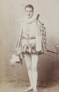 Portrait of Tj.AMA Humalda van Eysinga in costume with hat in hand, album page, photograph,