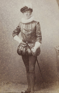 Portrait of a young man in costume with a sword, identified as CA Bergsma, album page, photograph,