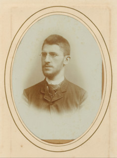Portrait of a man with glasses, album page, photograph, cabinet photograph, This photo is part of