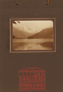 Landscape with mountains and lake, album page, photograph, This photo is part of an album.,