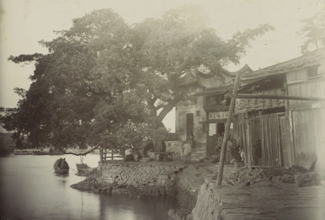View of a house with a yard along the water, presumably in Fuzhou, photograph, Part of travel album