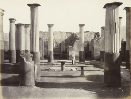 Remains of buildings with a statue in Pompeii, photograph, Part of Travel album with photos of