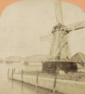 Vue prize a Dordrecht, View of a mill and the railway bridge over the Oude Maas near Dordrecht,