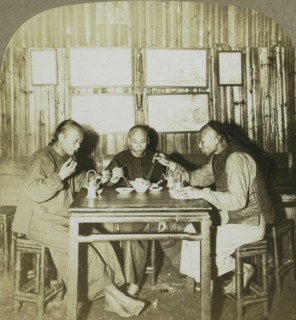 Chinamen eating chow in a restaurant. Canton, China, Three Chinese men at a meal, stereograph,