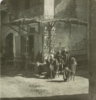 Luksor. Arabs Cafe, Guests in front of a café in Luxor, stereograph, number: '148', Luxor,
