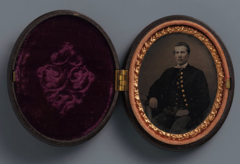 Portrait of an unknown man, possibly a soldier, photograph, union case, 1861, photographer, textile