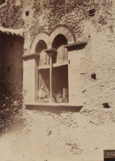 Unknown woman in a window, presumably in Italy, photograph, number: '163', photographer: Giovanni