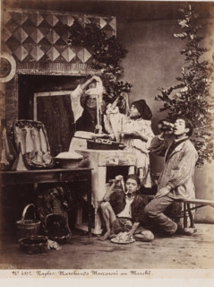 Scene with four people eating spaghetti in Naples, Italy, Marchands Maccaroni au Marché, Naples,