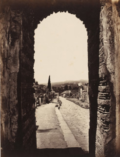 View through the gate of Herculaneum in Pompeii, Italy, photograph, inscription: 'Pompei porte