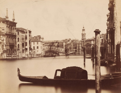 View of the Grand Canal with the Rialto Bridge in the background in Venice, Italy, photograph,