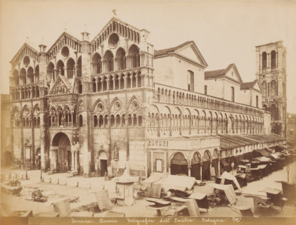 Ferrara, Duomo, View of the west facade of the cathedral in Ferrara and a market in the square,