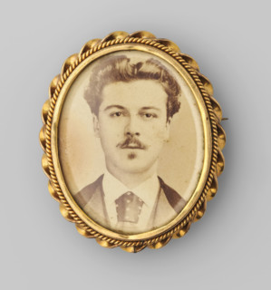 Portrait of an unknown young man with a moustache, photograph, brooch, inscription: 'Paris