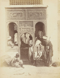 Photo reproduction of the painting 'A barber's shop in Cairo' by Willem de Famars Testas,