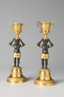 Pair of bronze candleholders, 19th Century