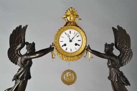 Tomire, Pendule (détail)