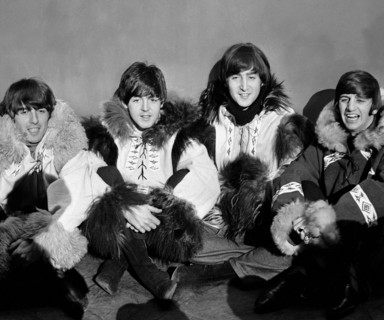 The Beatles pose for a group shot wearing eskimo outfits