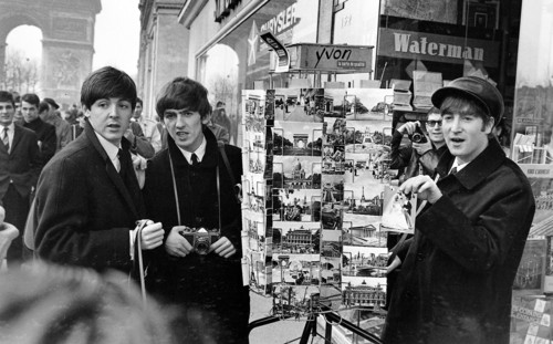 Paul MCCartney (left), George Harrison and John Lennon on the Champs Elysees before Ringo arrived