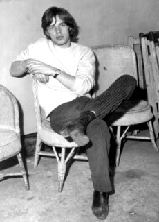 Mick Jagger sitting backstage, 21 September 1964.