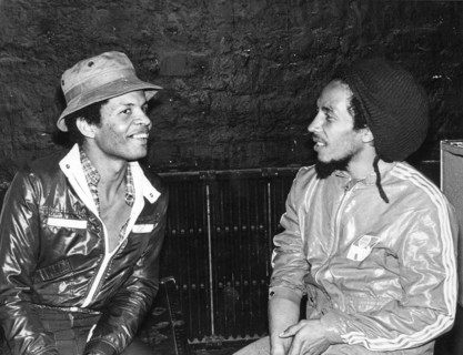 Jamaican singer songwriter and reggae musician Bob Marley (right) pictured with his manager Don