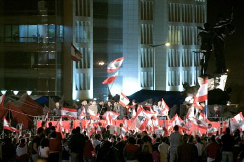 Lebanese protestors celebrate victory at Martyr's Square in Beirut